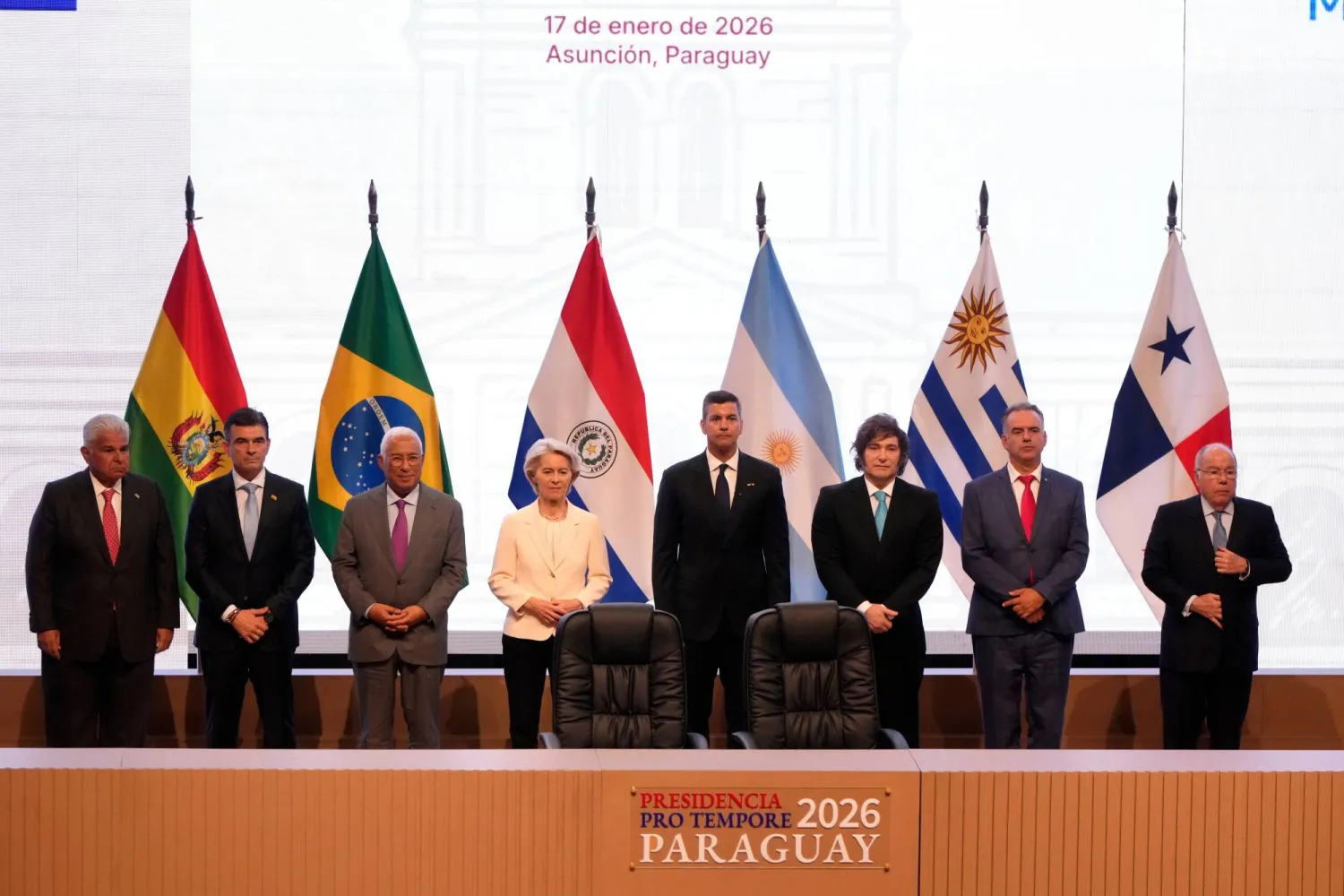 Panama's President Jose Raul Mulino, from left, Bolivian President Rodrigo Paz, European Council President Antonio Costa, European Commission President Ursula von der Leyen, Paraguay's President Santiago Pena, Argentina's President Javier Milei, Uruguay's President Yamandu Orsi and Brazilian Minister of Foreign Affairs Mauro Vieira, pose for a group photo during a meeting to sign a free trade deal between the European Union and Mercosur in Asuncion, Paraguay, Saturday, Jan. 17, 2026. (AP Photo/Jorge Saenz)