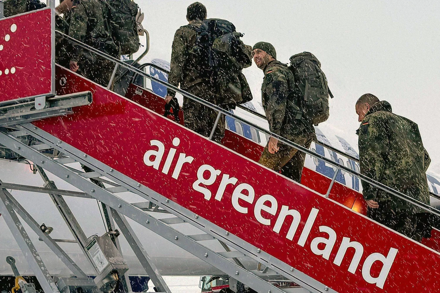 Military personnel from the German armed Forces Bundeswehr board Icelandair flight leaving Nuuk airport for Reykjavik on January 18, 2026 in Nuuk, Greenland. (AFP)