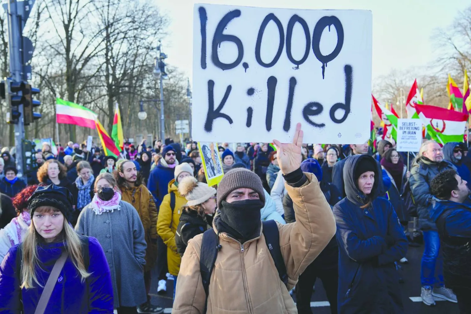 Protesters participate in a demonstration in support of the nationwide mass protests in Iran against the government, in Berlin, Germany, Sunday, Jan. 18, 2026. (AP Photo/Ebrahim Noroozi)