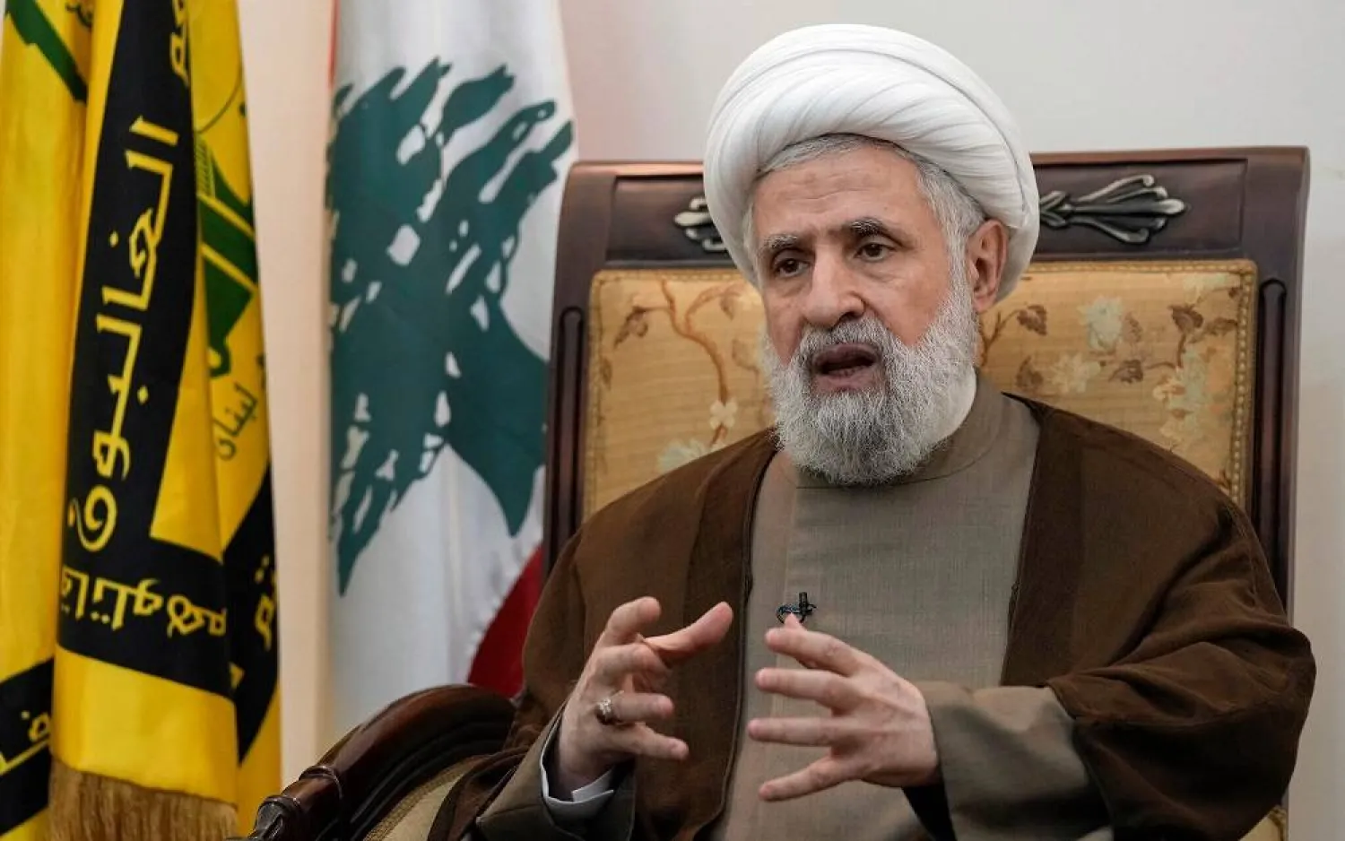 Hezbollah's then deputy leader Sheikh Naim Qassem speaks during an interview with The Associated Press in Beirut's southern suburbs, Lebanon, July 2, 2024. (AP)