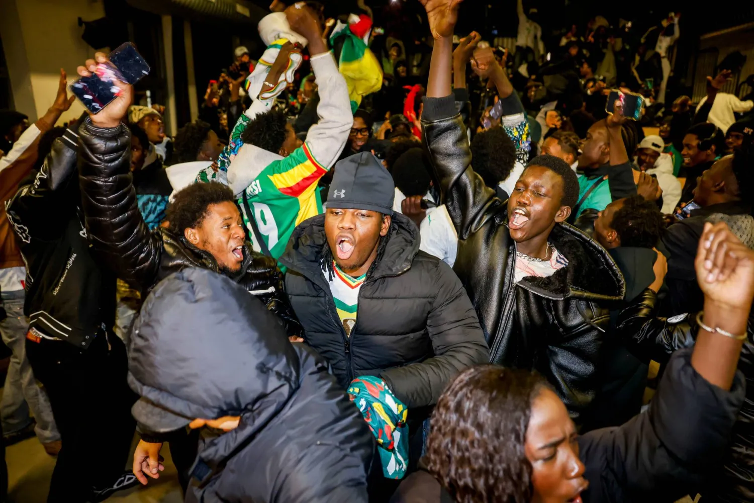 Senegal fans celebrate in Turin, Italy Sunday, Jan. 18, 2026, after Senegal won the Africa Cup of Nations final soccer match against Morocco. (Giulio Lapone/LaPresse via AP)