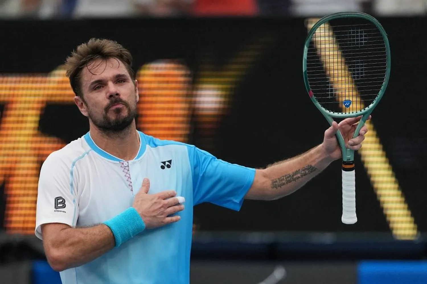 Stan Wawrinka of Switzerland celebrates after defeating Laslo Djere of Serbia in their first round match at the Australian Open tennis championship in Melbourne, Australia, Monday, Jan. 19, 2026. (AP)