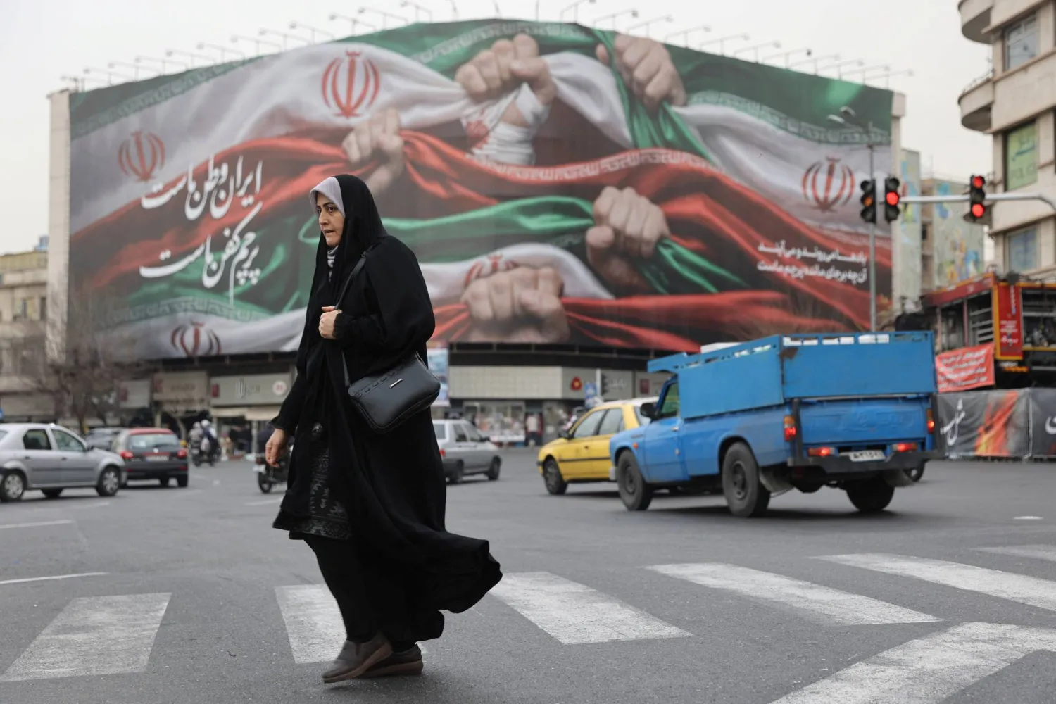  An Iranian woman walks on a street in Tehran, Iran, January 19, 2026. Majid Asgaripour/WANA (West Asia News Agency) via Reuters