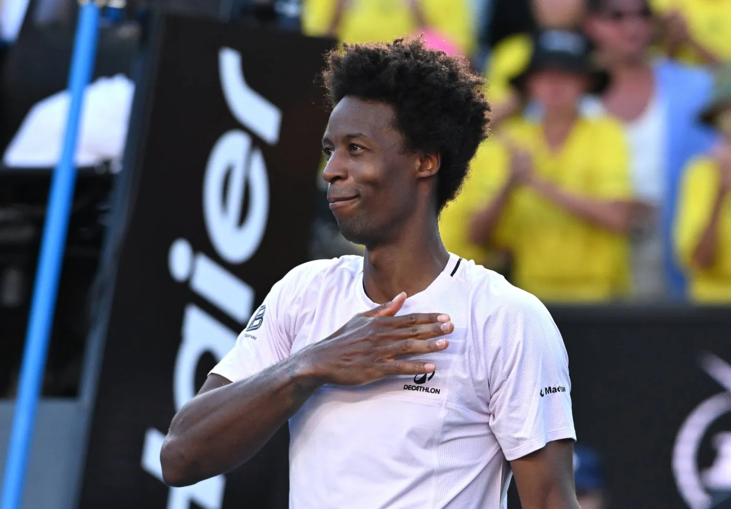 Gael Monfils of France acknowledges to the crowds after losing his Men’s Singles first round match against Dane Sweeny of Australia at the Australian Open tennis tournament in Melbourne, Australia, 20 January 2026. (EPA)