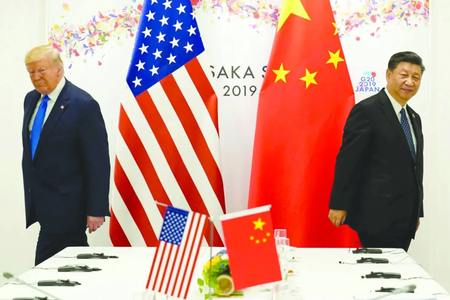 الرئيس الأميركي دونالد ترمب مع الرئيس الصيني شي جينبينغ خلال قمة زعماء مجموعة العشرين في أوساكا باليابان يوم 29 يونيو 2019 (رويترز)