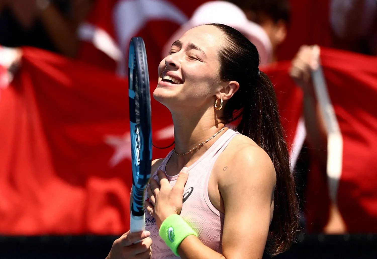 Tennis - Australian Open - Melbourne Park, Melbourne, Australia - January 21, 2026 Türkiye’s Zeynep Sonmez celebrates after winning her second round match against Hungary's Anna Bondar. (Reuters)