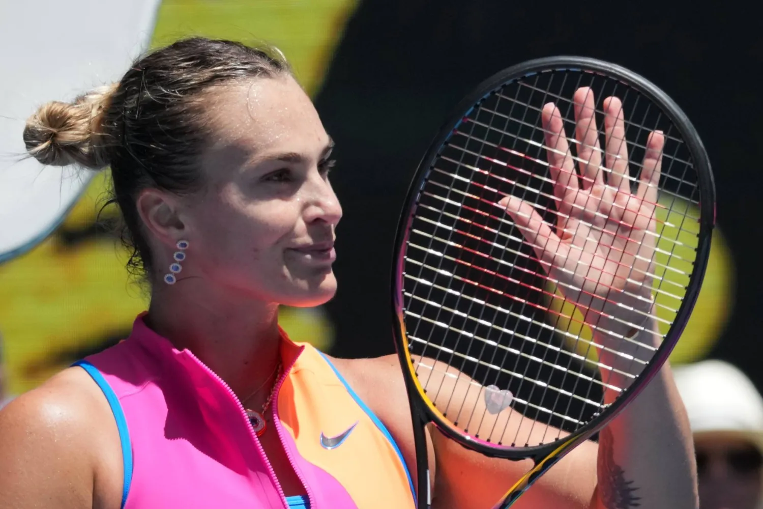 Aryna Sabalenka of Belarus celebrates after defeating Bai Zhuoxuan of China in their second round match at the Australian Open tennis championship in Melbourne, Australia, Wednesday, Jan. 21, 2026. (AP)