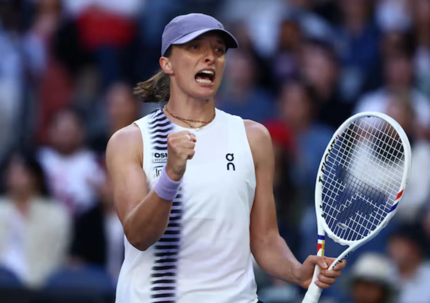 Tennis - Australian Open - Melbourne Park, Melbourne, Australia - January 22, 2026 Poland's Iga Swiatek celebrates after winning her second round match against Czech Republic's Marie Bouzkova REUTERS/Tingshu Wang 