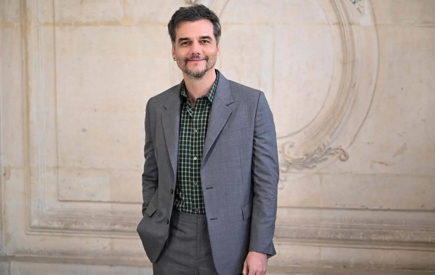 Brazilian actor and producer Wagner Moura poses for a photocall ahead of the Dior Menswear Ready-to-wear Fall-Winter 2026/2027 collection as part of the Men Paris Fashion Week in Paris on January 21, 2026. (AFP)