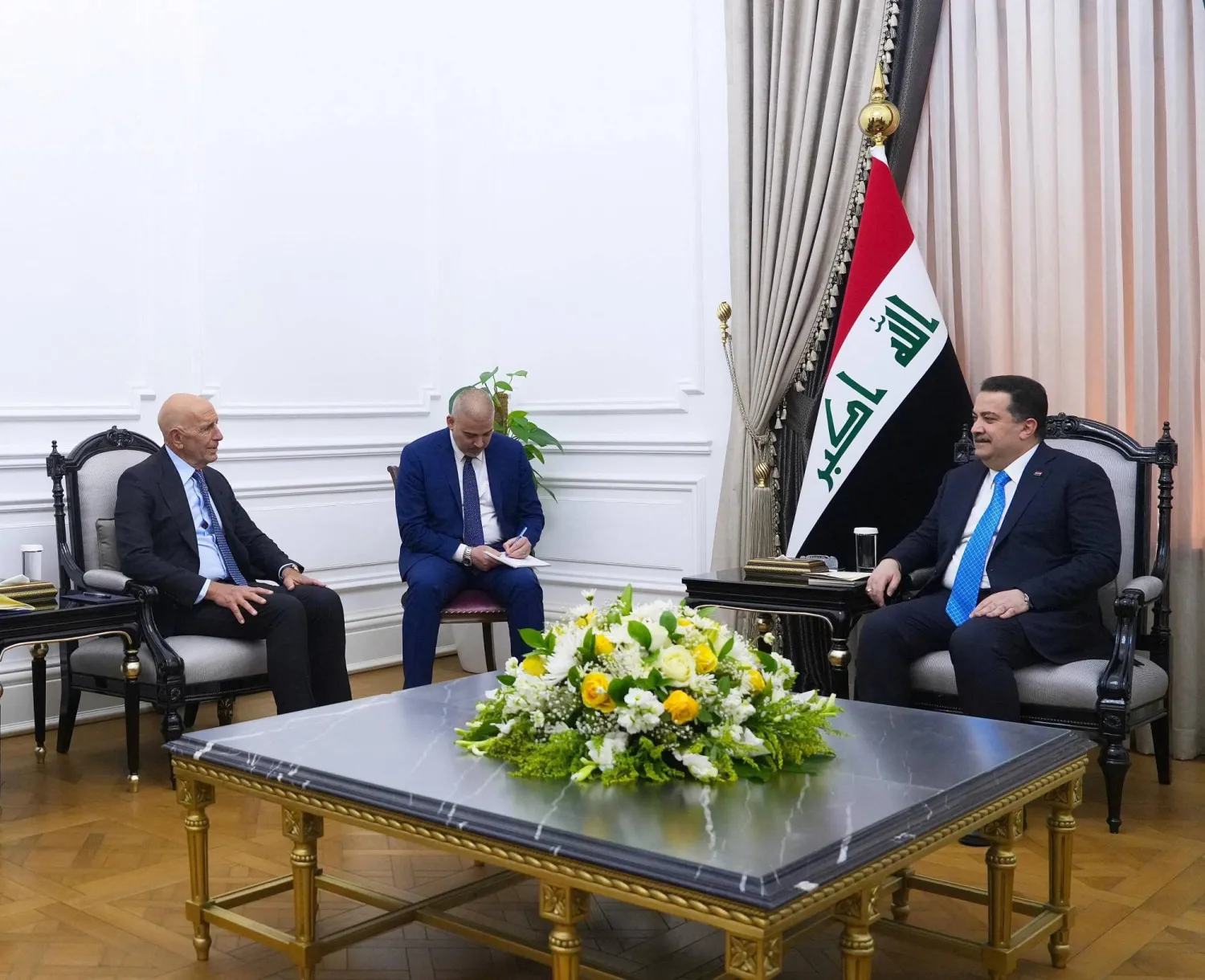 Iraqi Prime Minister Mohammed Shia al-Sudani meets with US Special Envoy to Syria Tom Barrack in Baghdad, January 22, 2026 (Reuters)