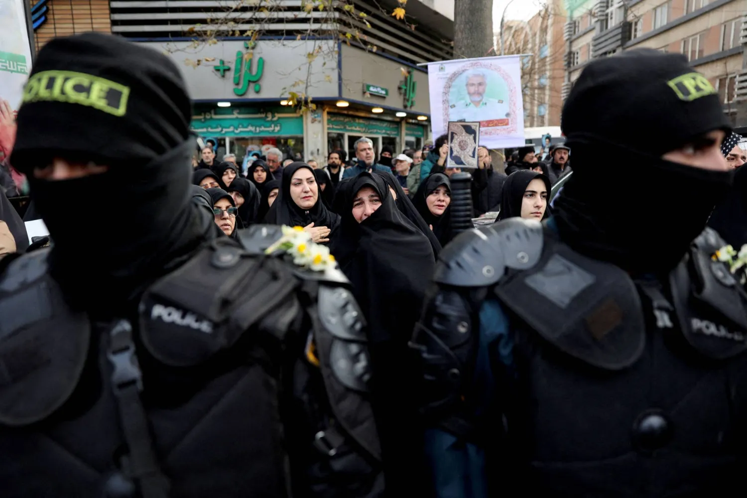 FILE PHOTO: People attend the funeral of the security forces who were killed in the protests that erupted over the collapse of the currency's value in Tehran, Iran, January 14, 2026. Majid Asgaripour/WANA (West Asia News Agency) via REUTERS  