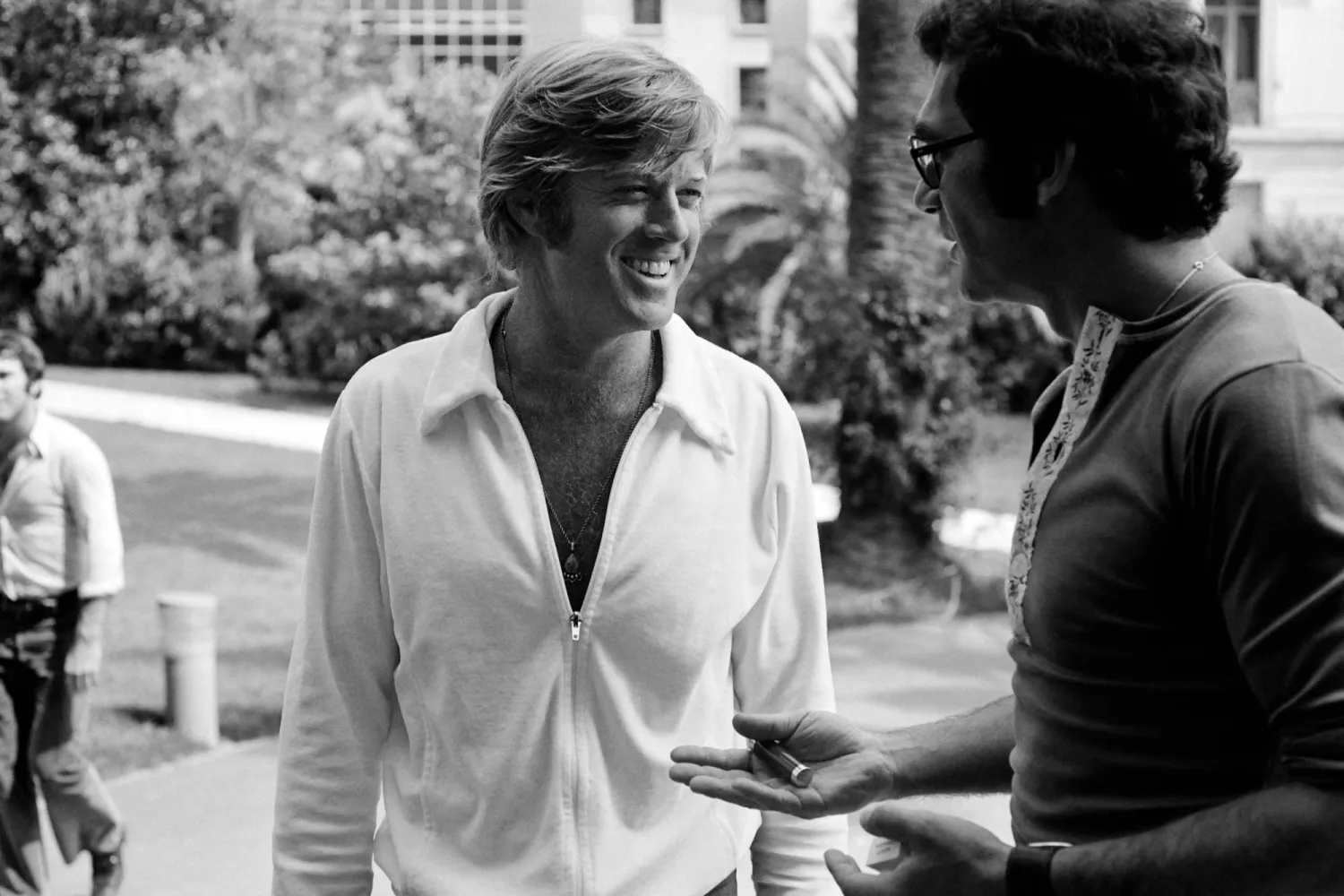 (FILES) Photo taken in May 1972 shows US actor Robert Redford (L) and director Sydney Pollack during the International Film Festival in Cannes. (Photo by AFP)