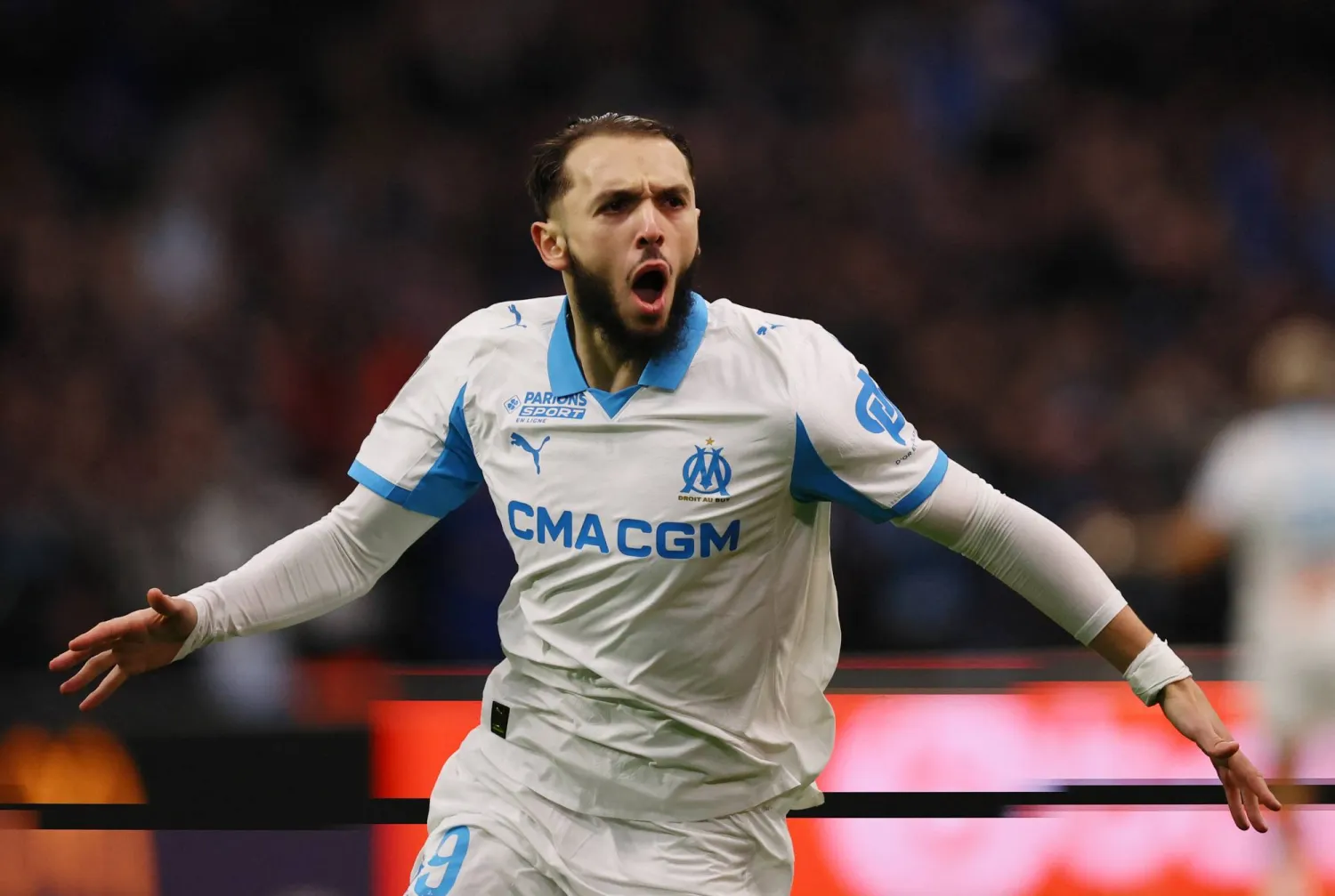 أمين الجويري محتفلا بهدفه الأول (رويترز)