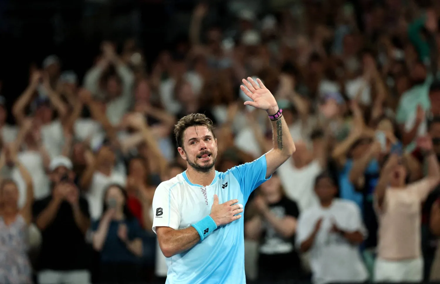  Tennis - Australian Open - Melbourne Park, Melbourne, Australia - January 24, 2026 Switzerland's Stan Wawrinka applauds fans in the stands after losing his third round match against Taylor Fritz of the US. (Reuters)
