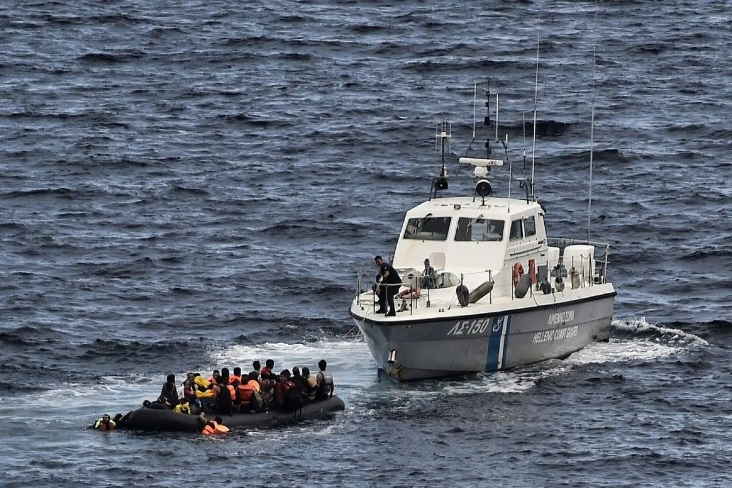 The Greek coast guard rescues refugees and migrants. (AFP/Getty Images)
