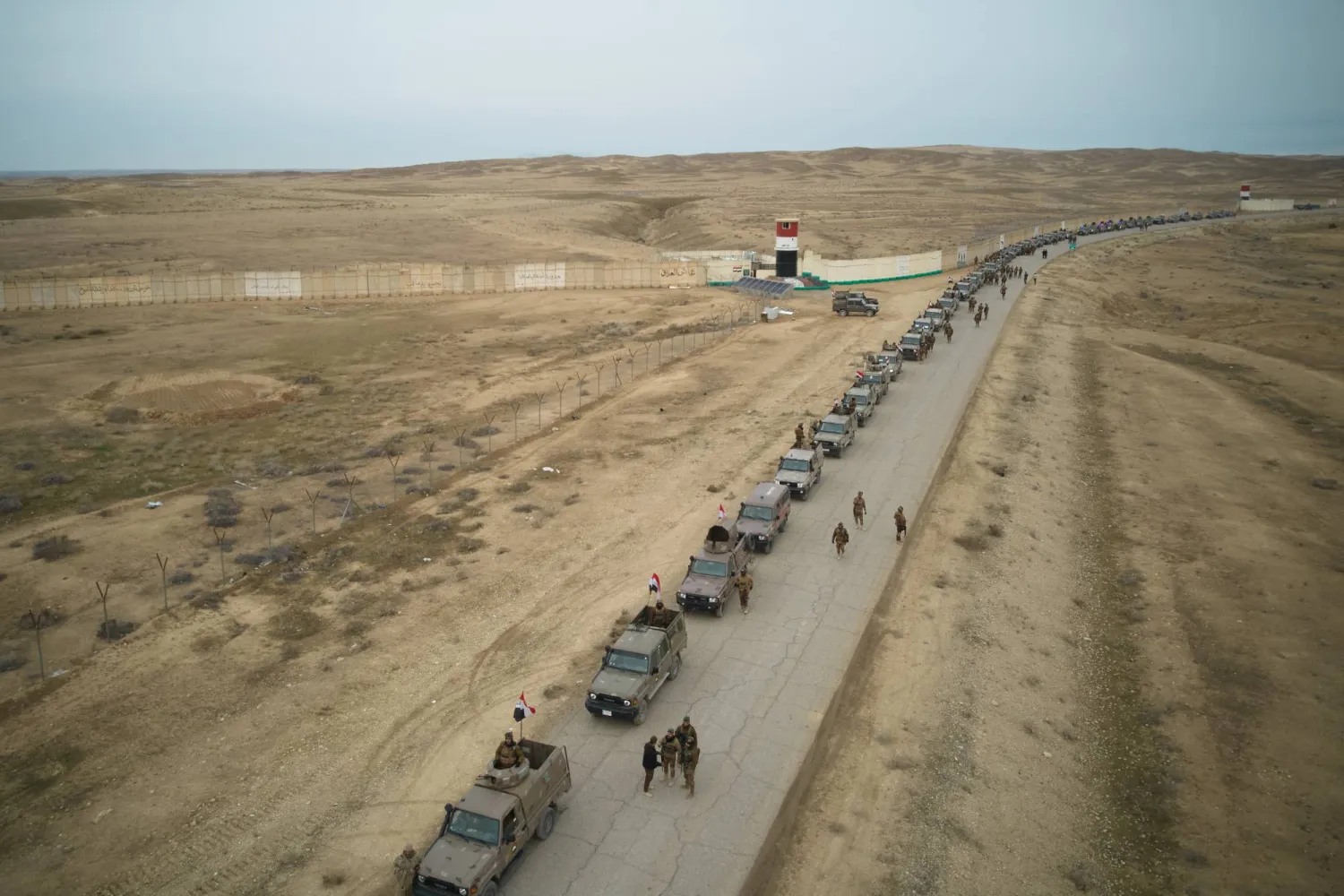  Iraqi Border Guards patrol in armored vehicles along the border with Syria, in Sinjar, northern Iraq, Thursday, Jan. 22, 2026. (AP) 