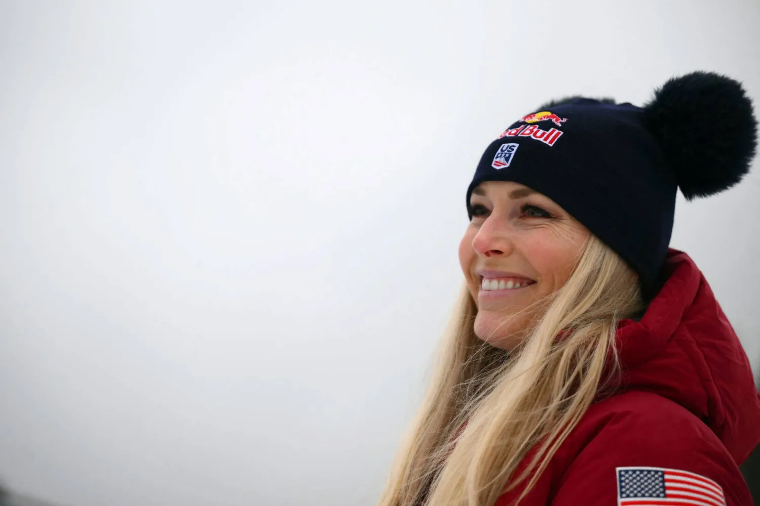 US' Lindsey Vonn smiles after the podium ceremony of the Women's Super G event of FIS Alpine Skiing World Cup in Tarvisio, Italy on January 18, 2026. (AFP)