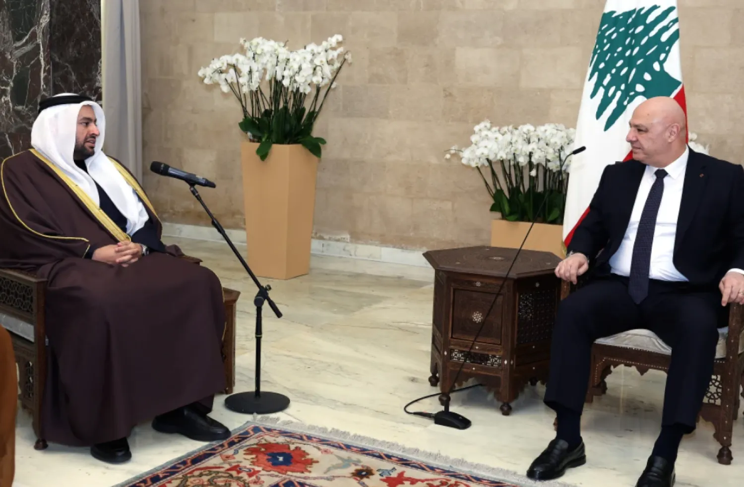 In this photo released by the Lebanese Presidency press office, Lebanese president Joseph Aoun, right, meets with Qatari Minister of State for Foreign Affairs Mohammed bin Abdulaziz Al-Khulaifi, at the presidential place in Baabda, east of Beirut, Lebanon, Monday, Jan. 26, 2026. (Lebanese Presidency press office via AP)

