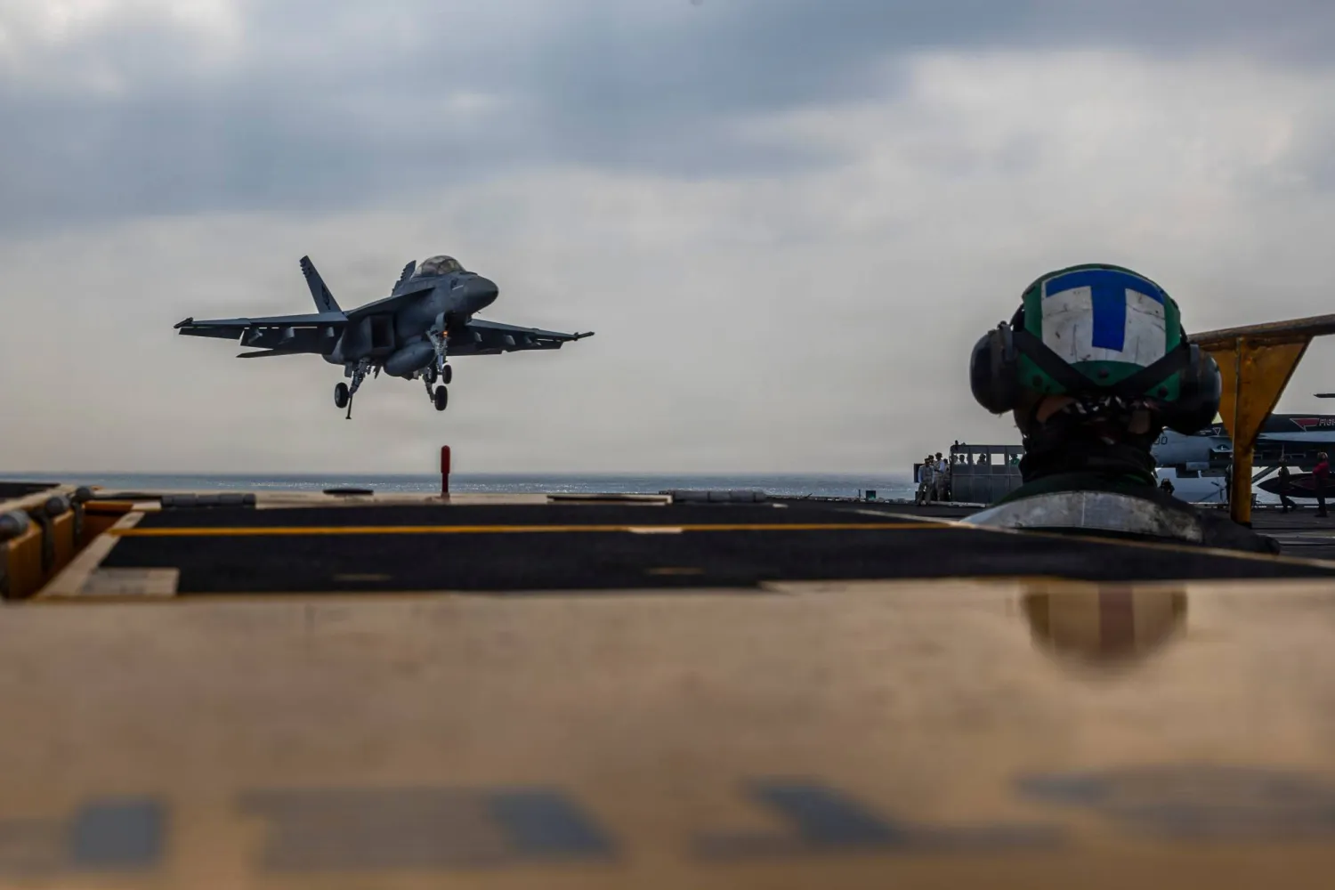  This photo provided by the US Navy shows a Boeing F/A-18E Super Hornet landing on the Nimitz-class aircraft carrier USS Abraham Lincoln in the Indian Ocean on Jan. 22, 2026. (Mass Communication Specialist Seaman Daniel Kimmelman/US Navy via AP)
