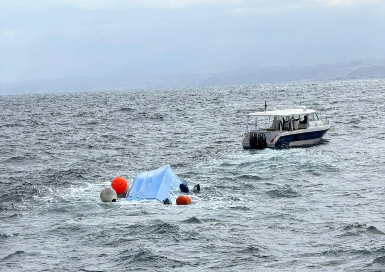 Image published by the Royal Oman Police of the distressed tourist boat (Oman News Agency)
