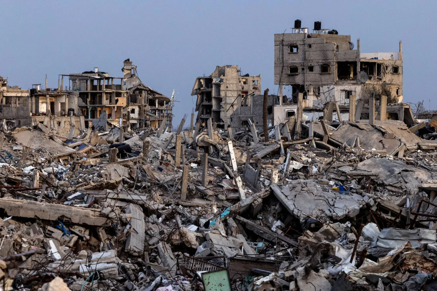 Buildings lie in ruins amidst the rubble in Rafah in the southern Gaza Strip, December 8, 2025. (Reuters)