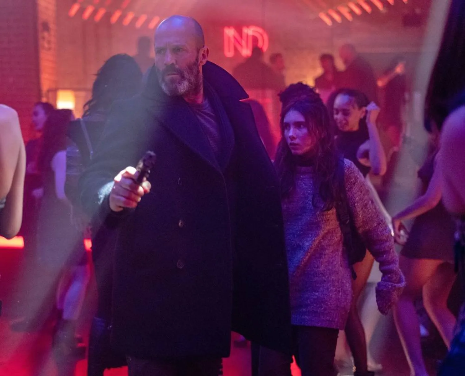  This image released by Black Bear shows Jason Statham, center, in a scene from "Shelter." (Black Bear via AP) 