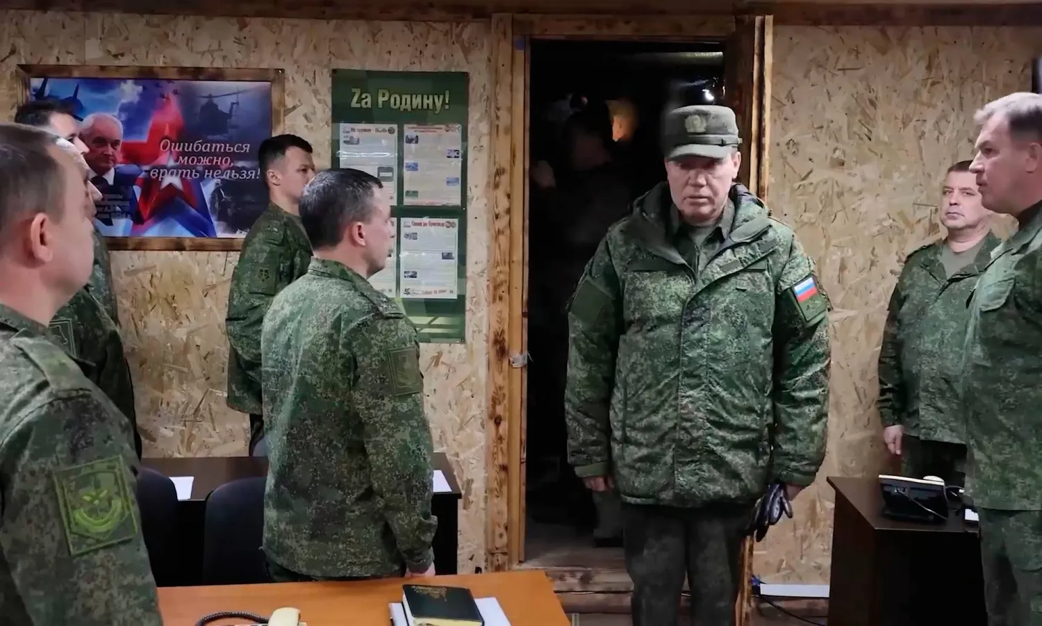 In this image made from video provided by Russian Defense Ministry Press Service on Thursday, Jan. 15, 2026, Russian Chief of General Staff Gen. Valery Gerasimov, third right, arrives to inspect the troops involved in the fighting in Ukraine. (Russian Defense Ministry Press Service via AP)