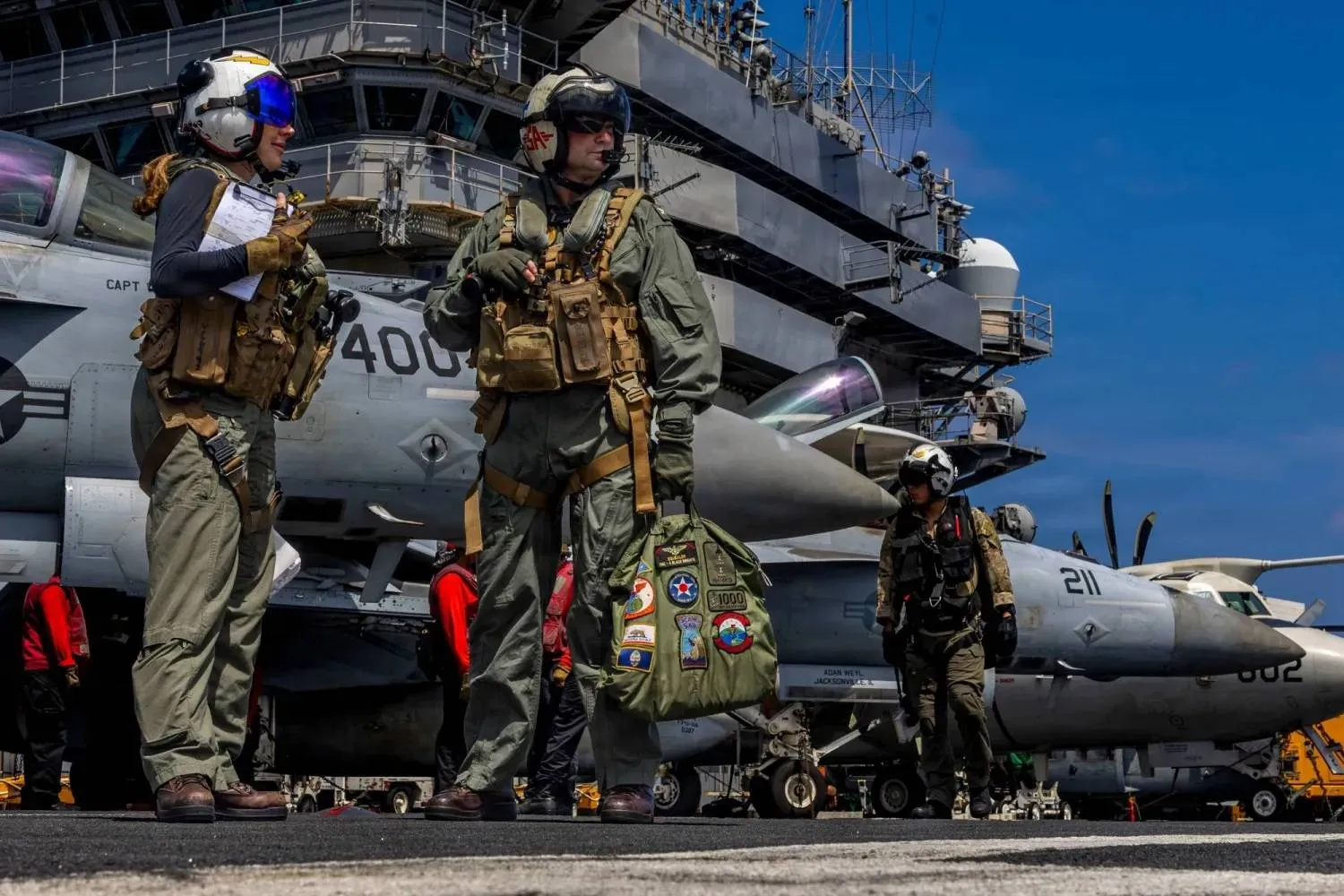 Military equipment, including helicopters, on board the aircraft carrier Abraham Lincoln (AP)