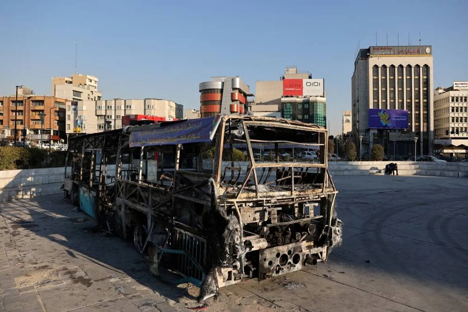 A bus burned during protests on a street in Tehran, Iran, January 16, 2026. Majid Asgaripour/WANA (West Asia News Agency) via Reuters
