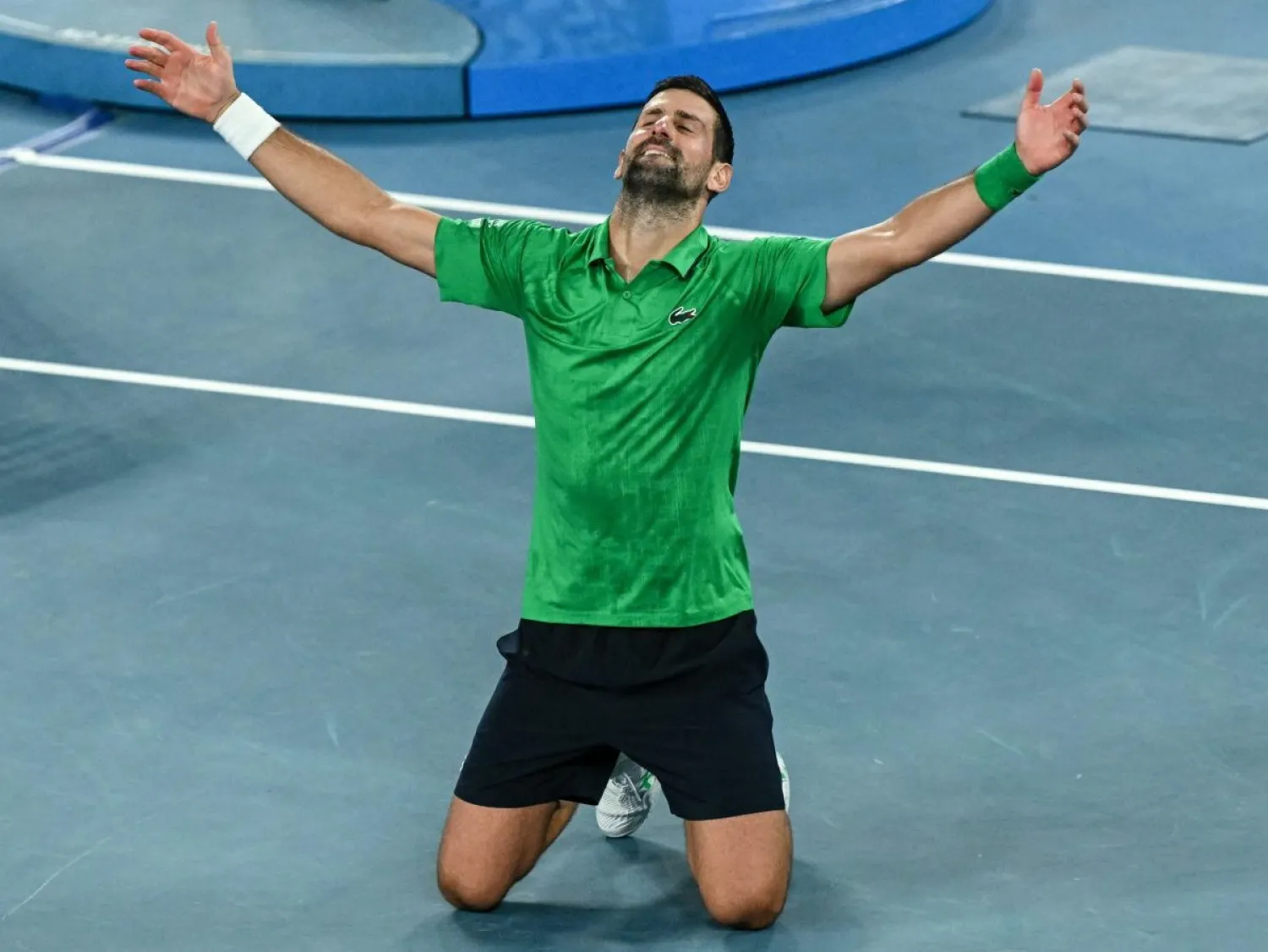 نوفاك محتفلاً بالفوز الكبير (أ.ف.ب)