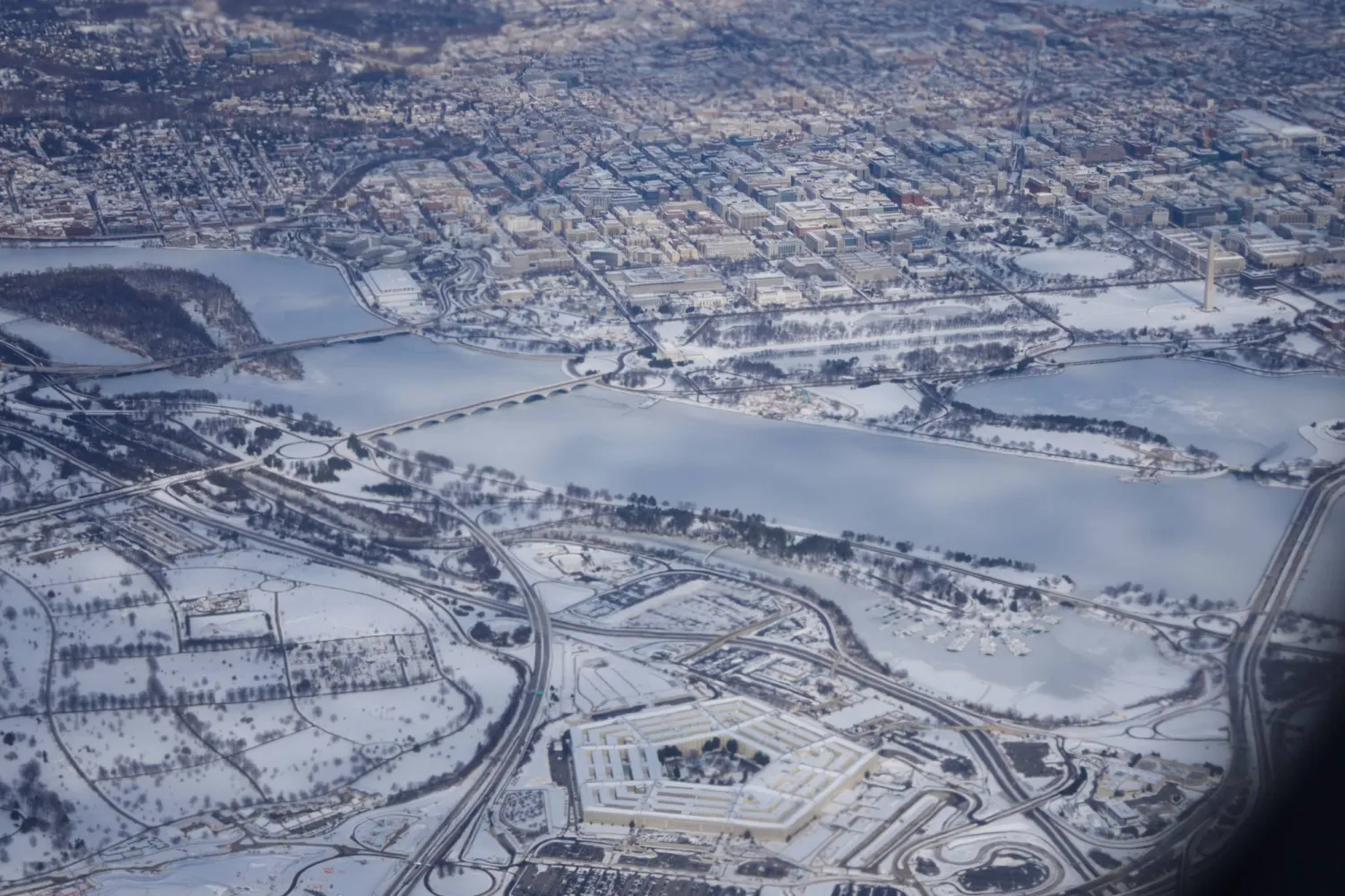 This aerial image shows the Potomac River, with a view of the Pentagon at bottom, Tuesday, Jan. 27, 2026 in Washington. (AP Photo/Mark Schiefelbein)