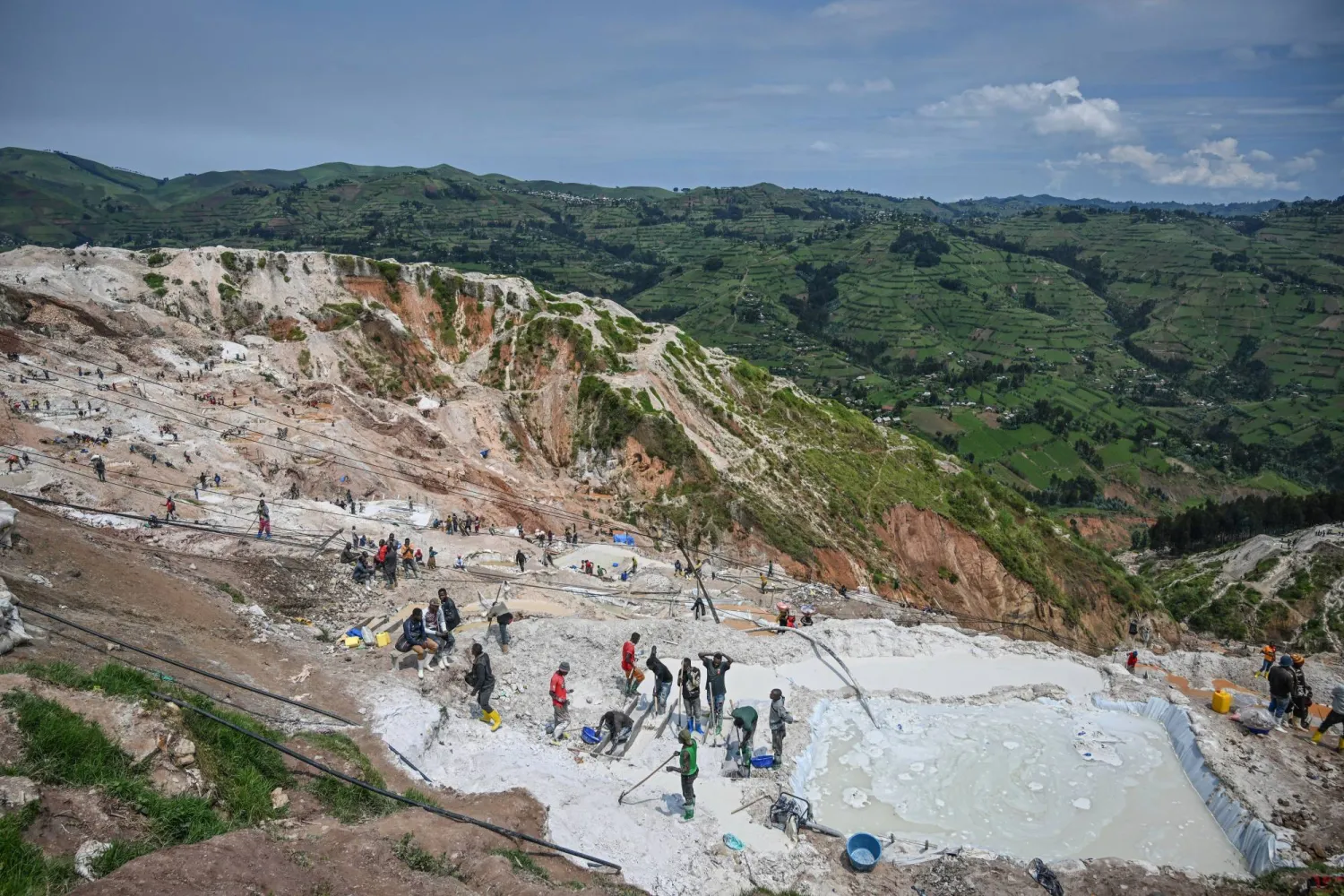 FILE - Miners work at the D4 Gakombe coltan mining quarry in Rubaya, Congo, May 9, 2025. (AP Photo/Moses Sawasawa, File)