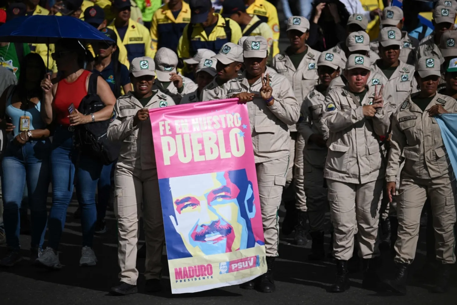 Caracas'ta Venezuela Ulusal Parklar Birimi (JN Parkes) üyeleri, Venezuela Devlet Başkanı Nicolás Maduro ve eşi Cilia Flores'in serbest bırakılmasını talep eden bir yürüyüş düzenledi, 8 Ocak 2026
