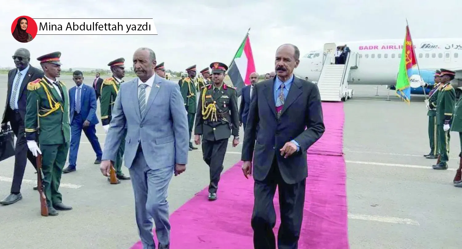 Eritre Devlet Başkanı İsaias Afwerki, iki ülkenin sınırlarını aşarak Afrika Boynuzu ve Kızıldeniz'e uzanan güvenlik denkleminin temel taşı olarak Sudan'a güveniyor Eritre Devlet Başkanı İsaias Afwerki, iki ülkenin sınırlarını aşarak Afrika Boynuzu ve Kızıldeniz'e uzanan güvenlik denkleminin temel taşı olarak Sudan'a güveniyor Eritre Devlet Başkanı İsaias Afwerki, iki ülkenin sınırlarını aşarak Afrika Boynuzu ve Kızıldeniz'e uzanan güvenlik denkleminin temel taşı olarak Sudan'a güveniyor (Sudan Egemenlik Konseyi Facebook sayfası) 