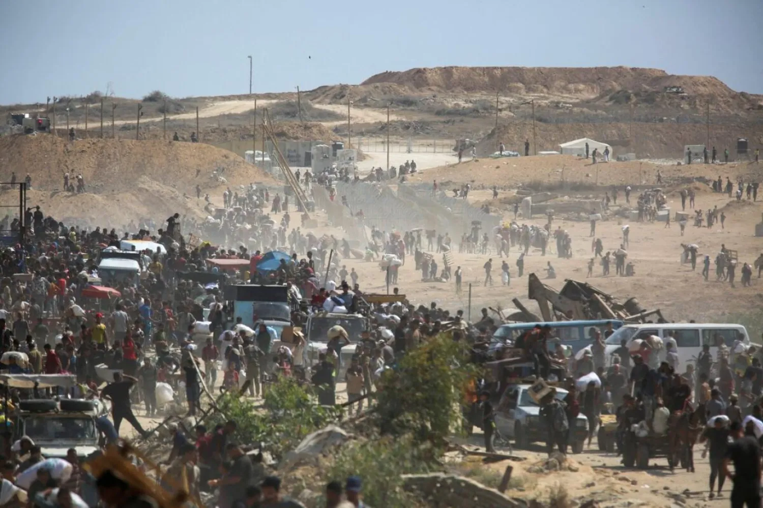 Çelik tellerle örülü GHF tesisleri, İsrail ordusu ve Amerikan paralı asker şirketleri tarafından korunuyordu (Reuters)