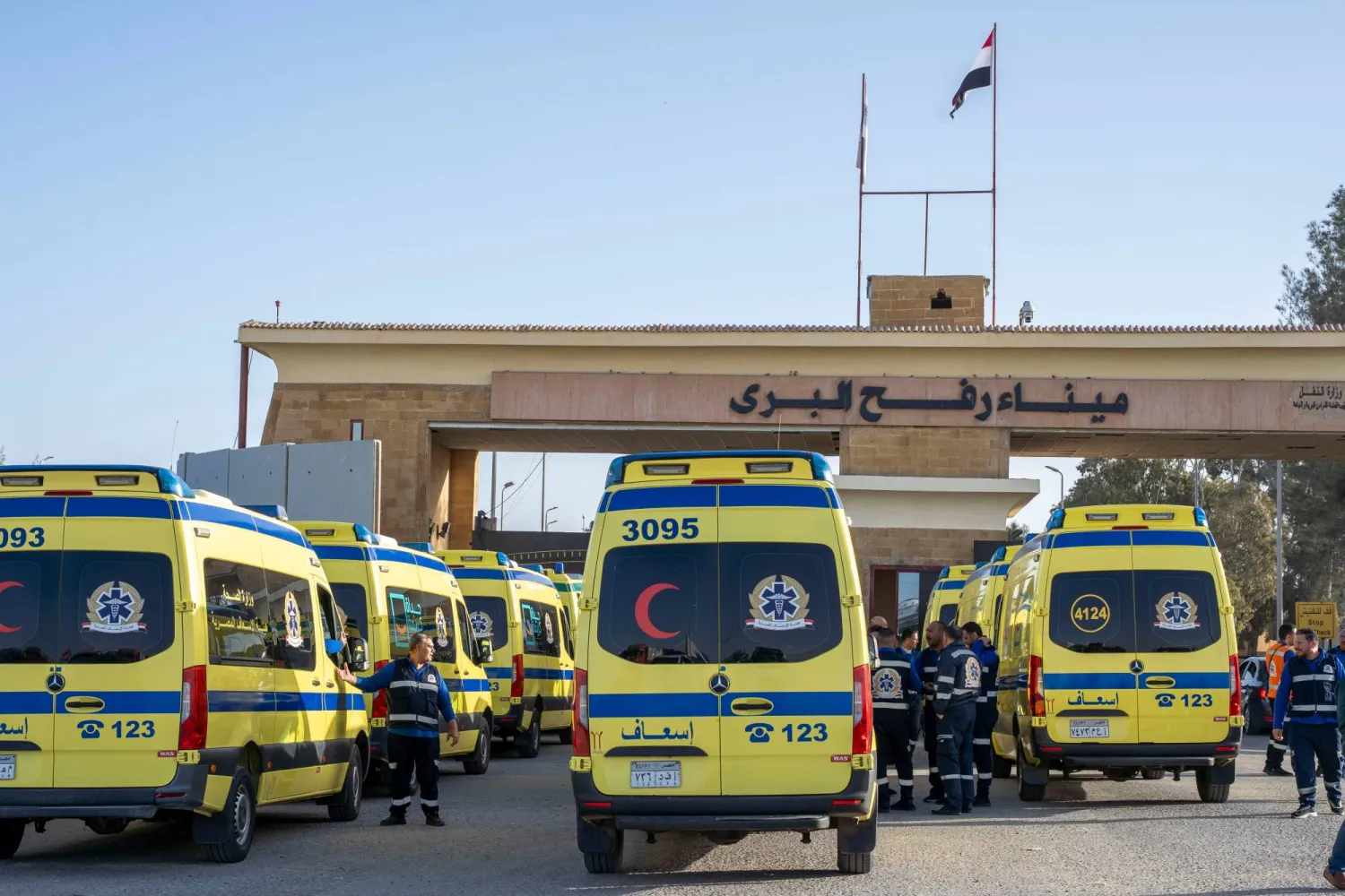 Ambulances line up to enter the Egyptian gate of the Rafah crossing on the way to the Gaza Strip, in Rafah, Egypt, Sunday, Feb. 1, 2026. (AP Photo/Mohamed Arafat)