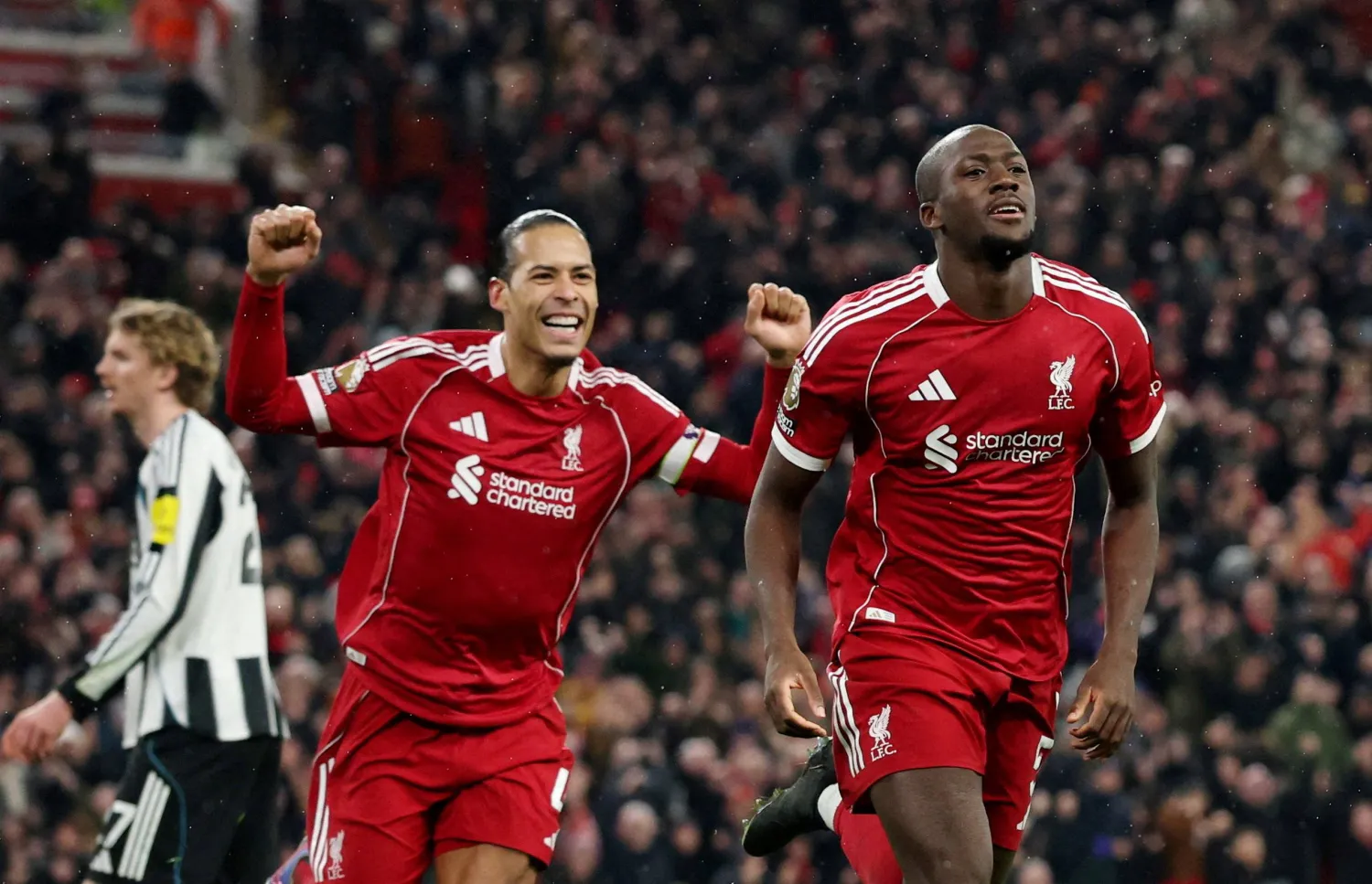 Football - Premier League - Liverpool v Newcastle United - Anfield, Liverpool, Britain - January 31, 2026 Liverpool's Ibrahima Konate celebrates scoring their fourth goal with Liverpool's Virgil van Dijk. (Reuters)