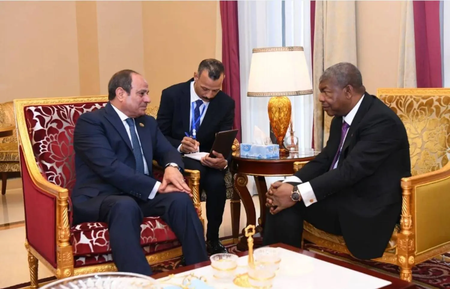 The Egyptian president during his meeting with his Angolan counterpart in Guinea last July (Egyptian Presidency). 