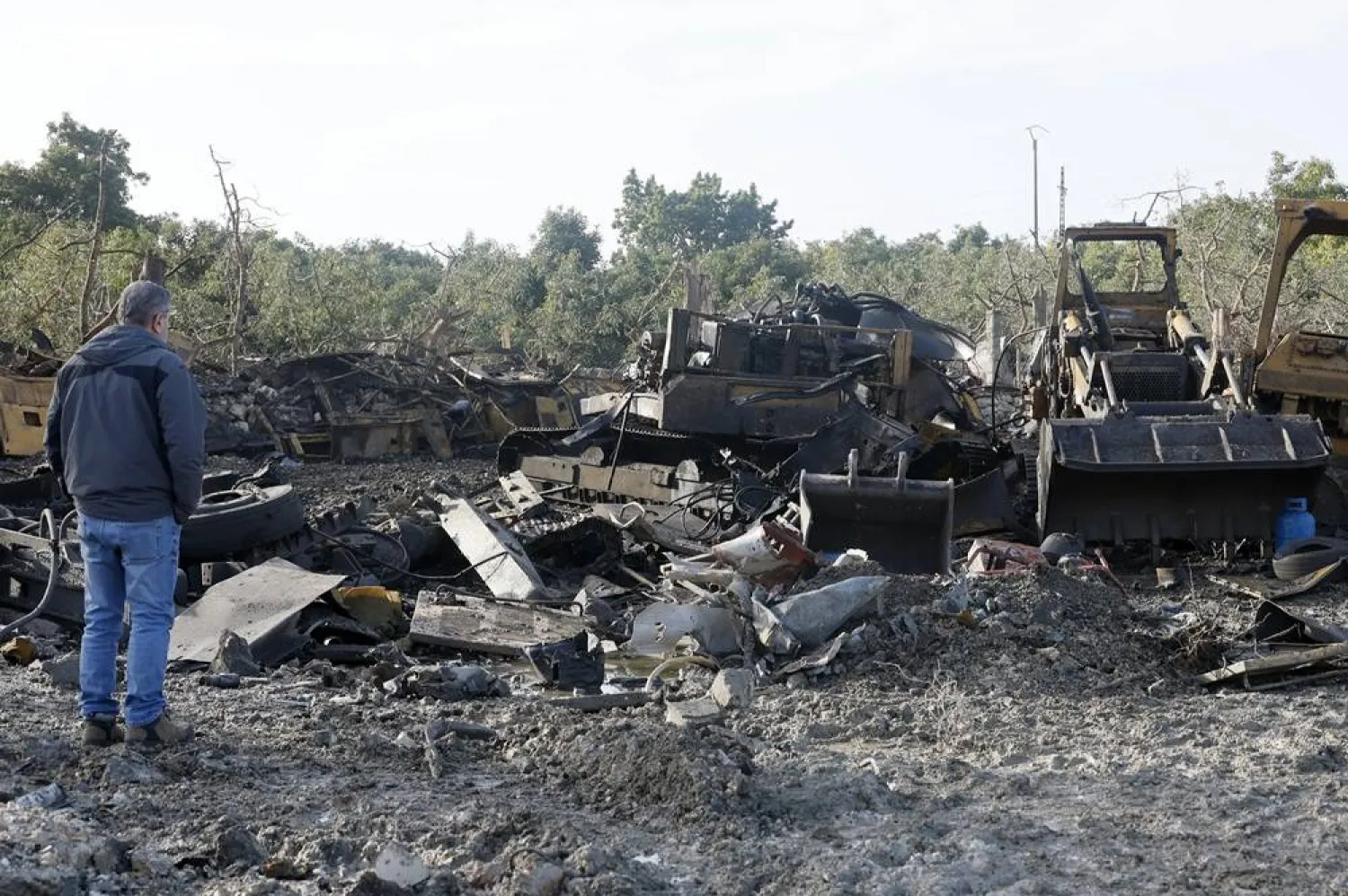A person inspects the site a day after a series of Israeli airstrikes struck a large piece of industrial machinery in the southern Lebanese village of Al-Marwanieh, Lebanon, on 31 January 2026. (EPA)