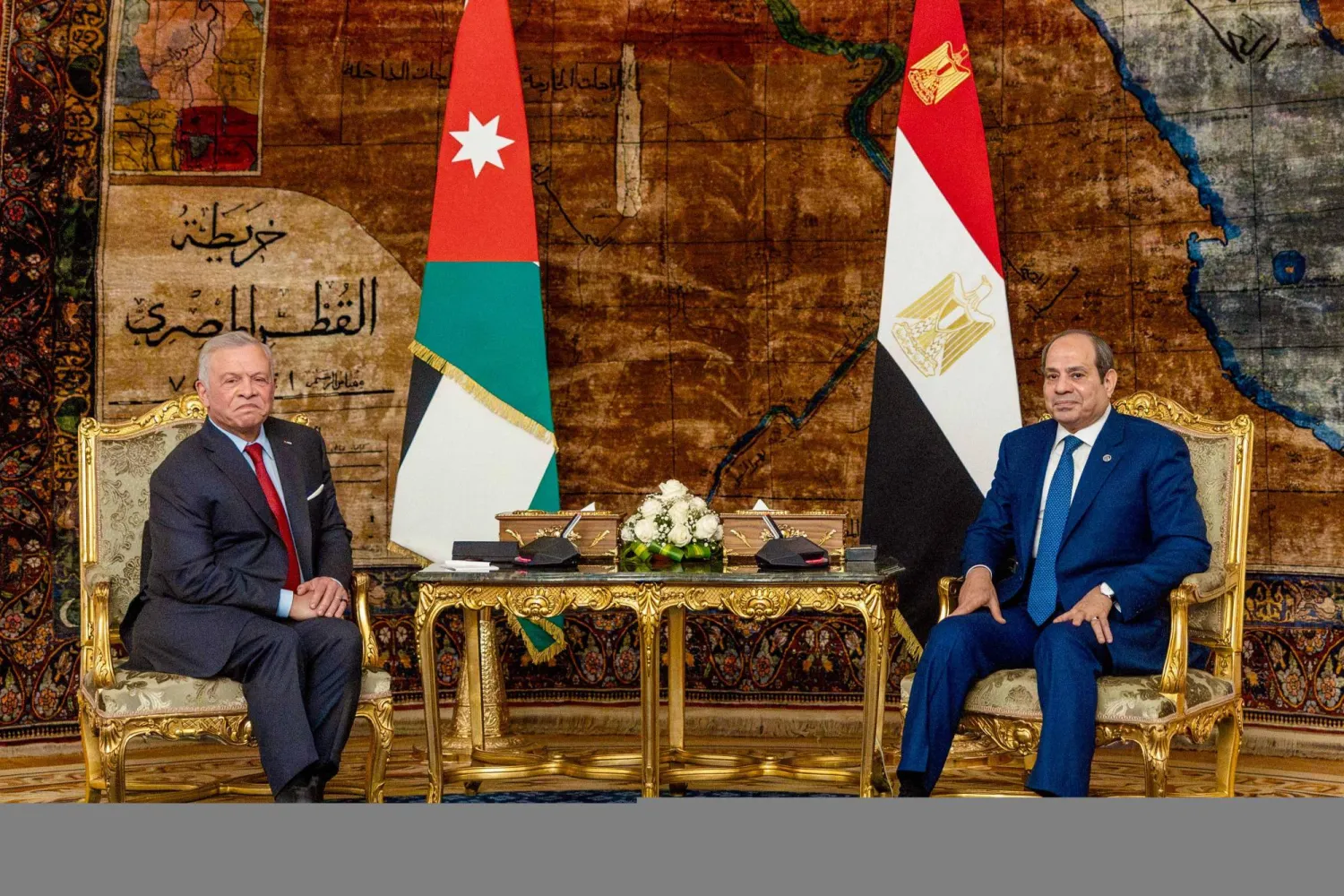 A handout picture released by Jordanian Royal Palace on February 1, 2026, shows Jordan's King Abdullah II meeting with Egypt's President Abdel Fattah al-Sisi (R) at the al-Ittihadiya Presidential Palace in Cairo. (Handout / Jordanian Royal Palace / AFP)