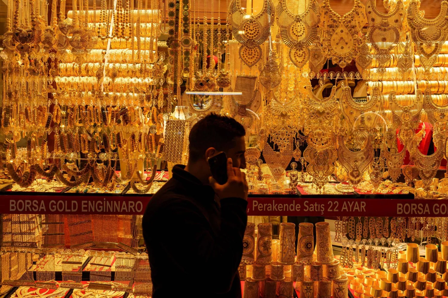 A man walks past a gold shop in the Grand Bazaar in Istanbul (AFP)