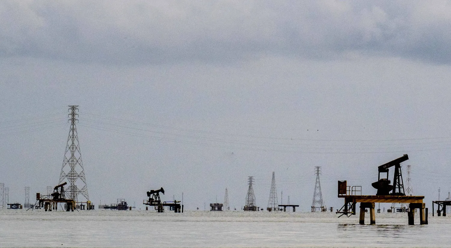 This image shows oil rigs in Cabimas, south of Lake Maracaibo, Zulia State, Venezuela, on January 31, 2026. (AFP)
