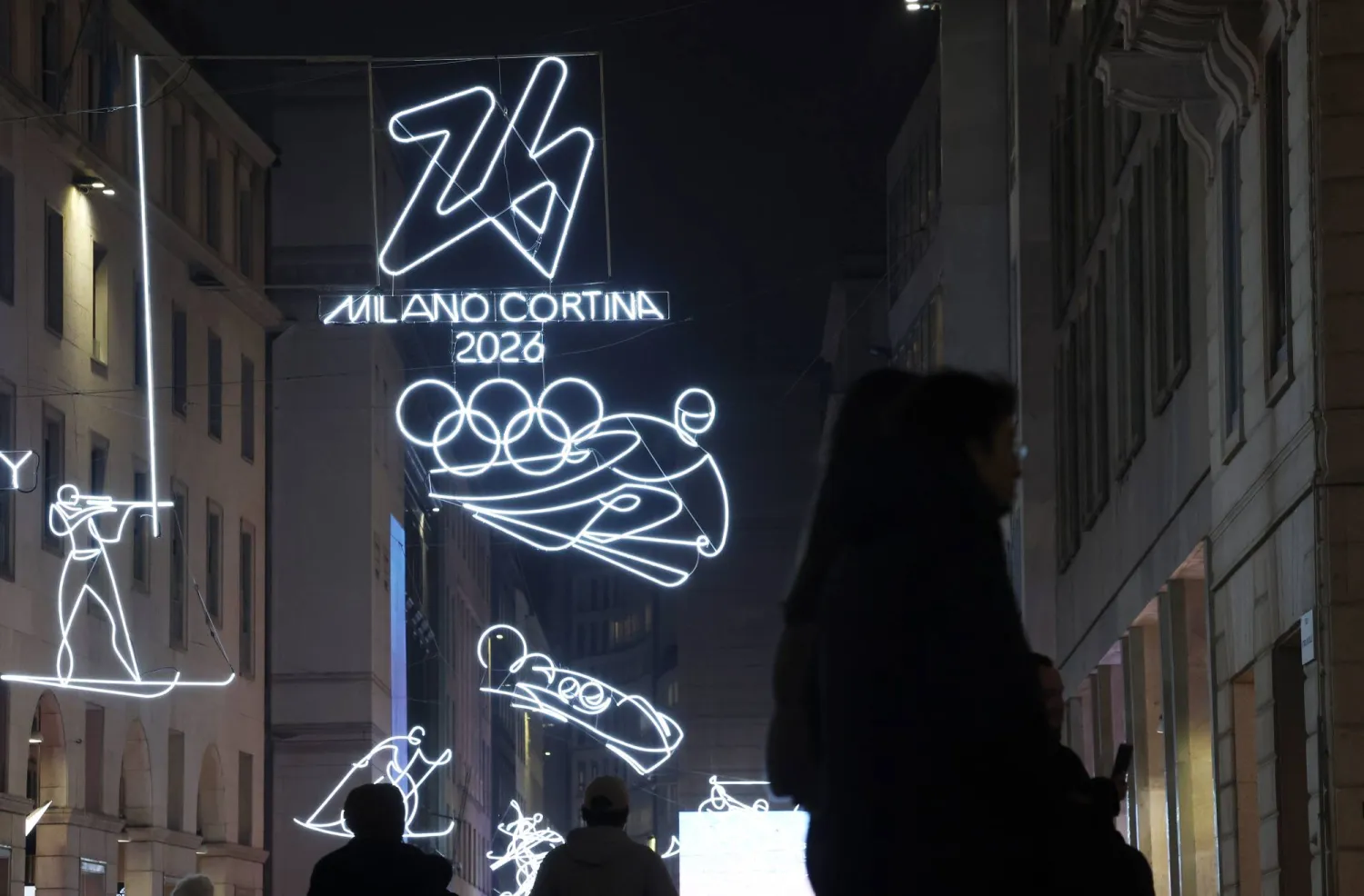Illuminated pictograms representing various disciplines are displayed in front of the Milan Cathedral in Milan, Italy, 03 February 2026, three days ahead of the 06 to 22 February Milan-Cortina Winter Olympics. (EPA)
