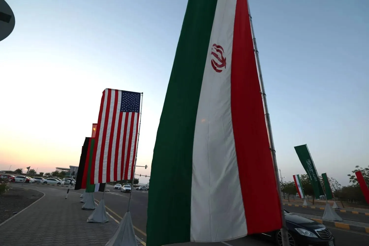 The flags of USA and Iran are displayed in Muscat, Oman, 25 April 2025. EPA/ALI HAIDER
