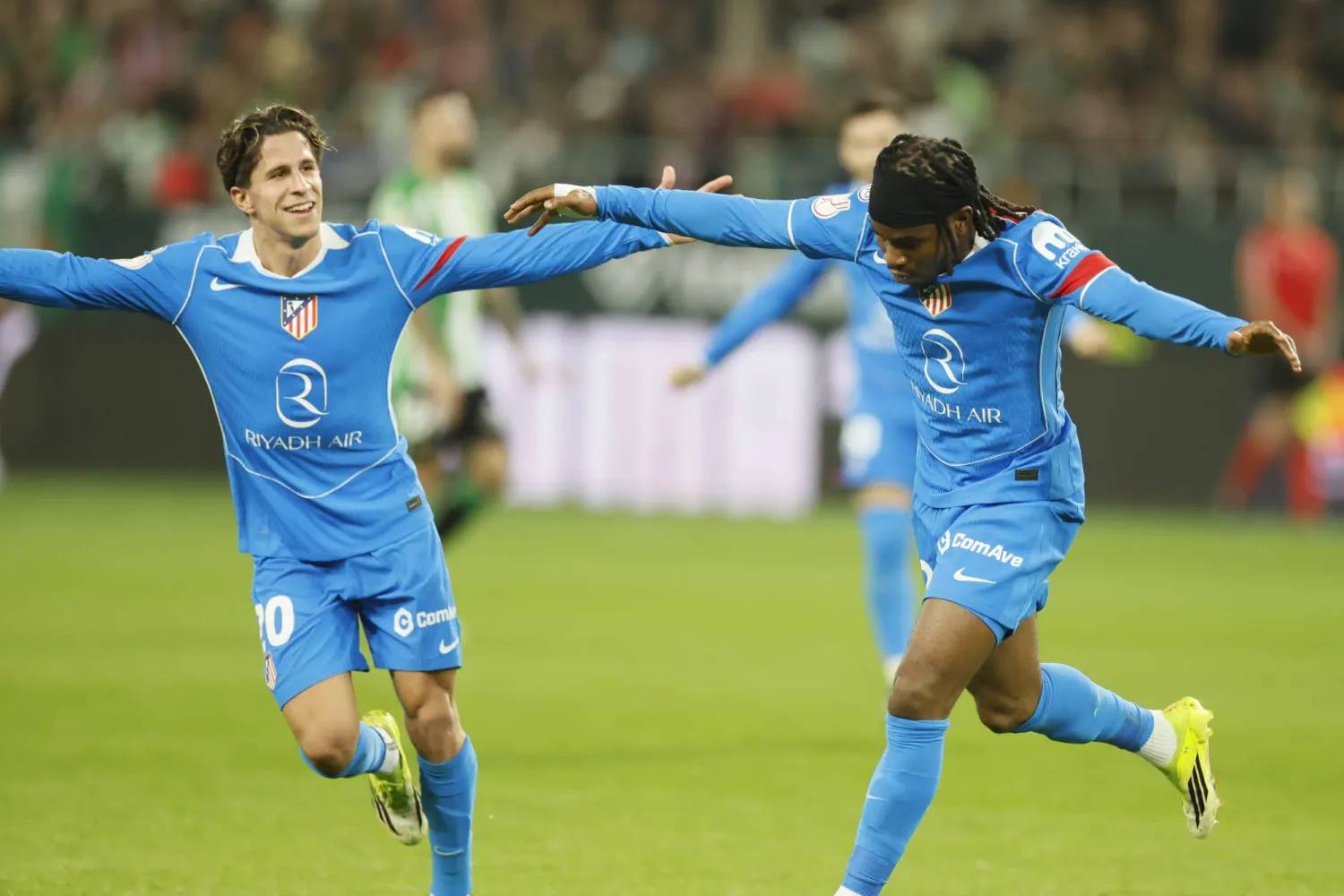 Atletico Madrid's Ademola Lookman (R) celebrates scoring the 0-3 goal during the Copa del Rey quarter-final soccer match between Real Betis and Atletico Madrid, in Seville, Spain, 05 February 2026.  EPA/Jose Manuel Vidal