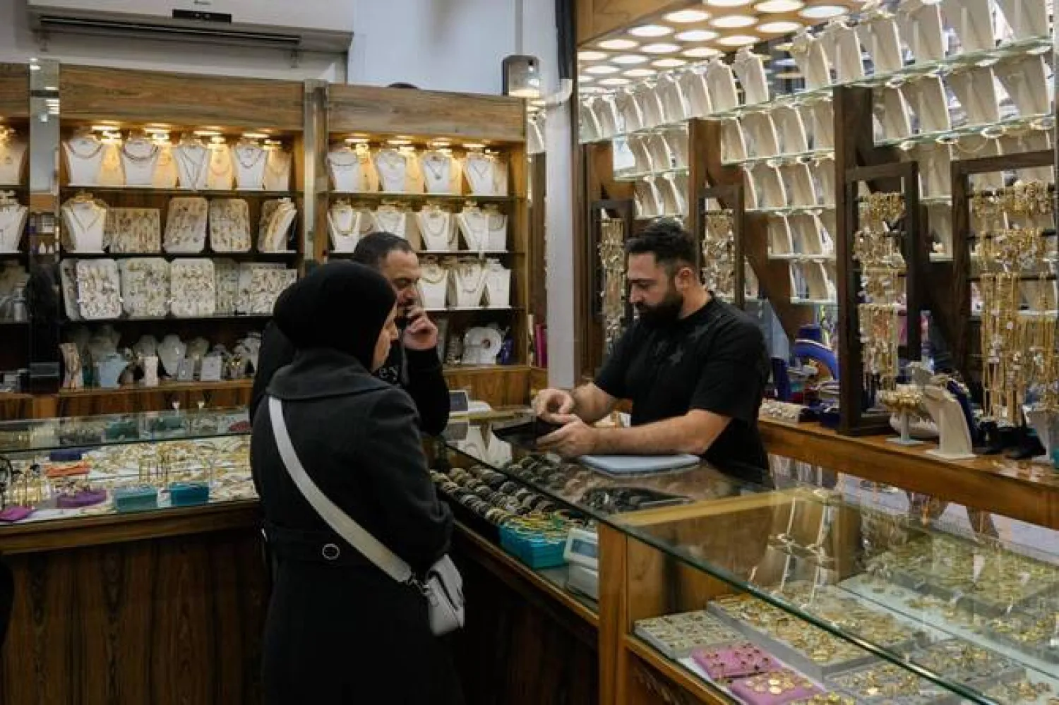 Meanwhile, many Lebanese are crowding marketplaces to buy gold and silver in hopes of recovering some of their losses. (AP)
