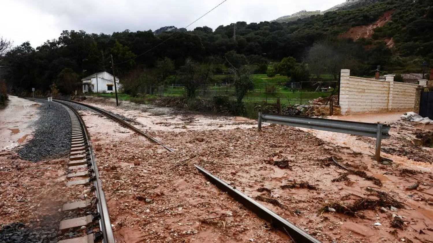  A mountain landslide blocks railway tracks during heavy rains, as storm Leonardo hits parts of Spain, in Benaojan, Spain, February 6, 2026. (Reuters)