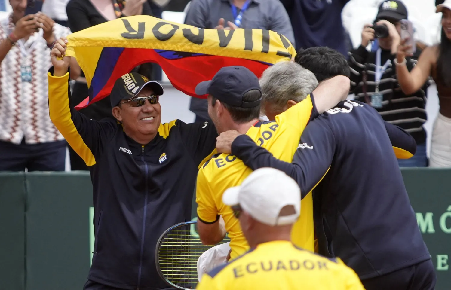 Tennis - Davis Cup - Qualifiers  - Ecuador v Australia - Quito Tenis y Golf Club, Quito, Ecuador - February 8, 2026 Team Ecuador celebrate winning the doubles match between Ecuador's Gonzalo Escobar and Diego Hidalgo, and  Australia's Rinky Hijikata and Jordan Thompson REUTERS/Cristina Vega