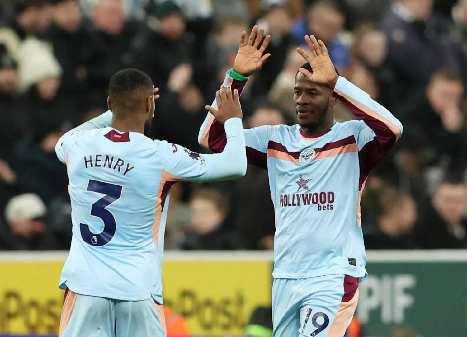 Football - Premier League - Newcastle United v Brentford - St James' Park, Newcastle, Britain - February 7, 2026 Brentford's Dango Ouattara celebrates scoring their third goal with Brentford's Rico Henry. (Reuters)