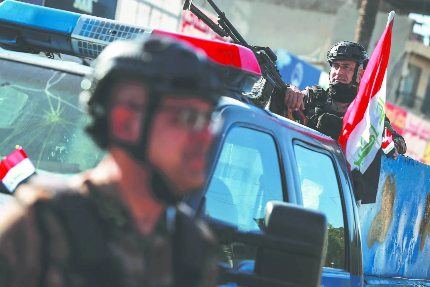 عناصر من الأمن العراقي في شوارع بغداد (د.ب.أ)